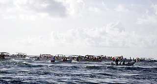 Boats caravan escorting Virgen del Valle from Crasqui to Gran Roque in Los Roques